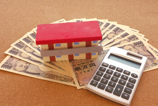 アパートの模型 1万円札 電卓